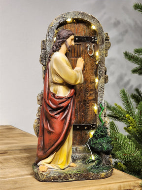 JESUS BATENDO NA PORTA EM RESINA COM LED 30CM